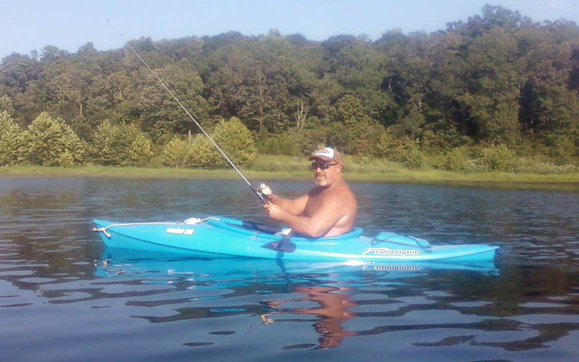 Man Fishing in Kayak